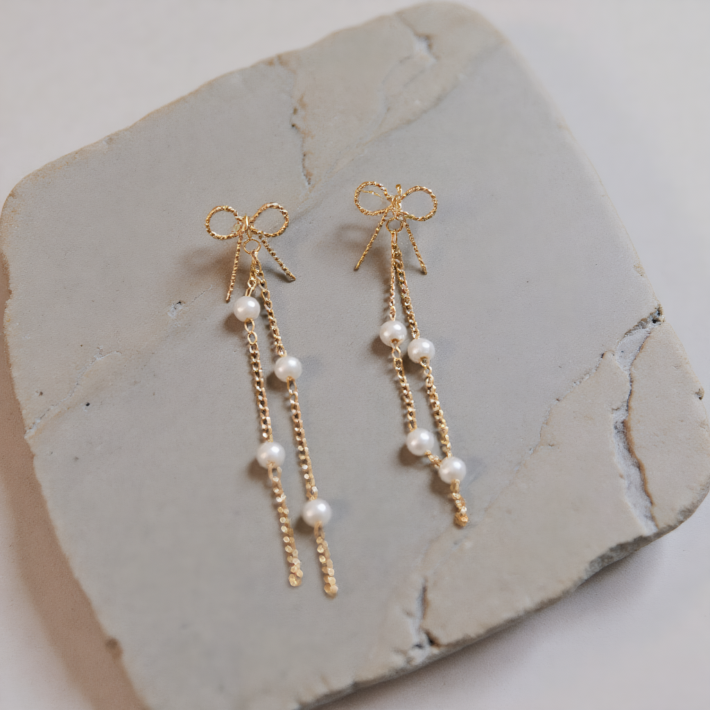 Long Bow Pearl Drop Earrings